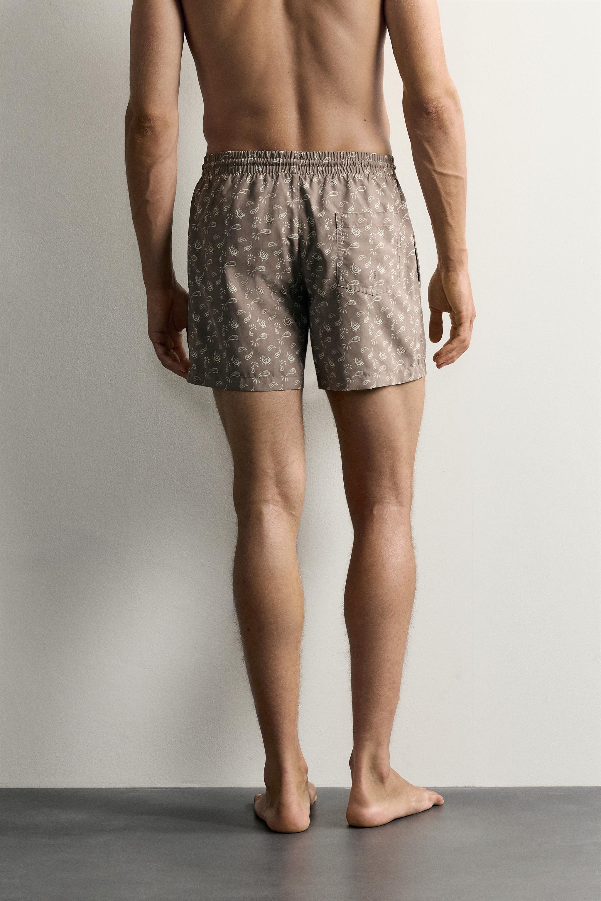 PAISLEY PRINT MID-LENGTH SWIM TRUNKS